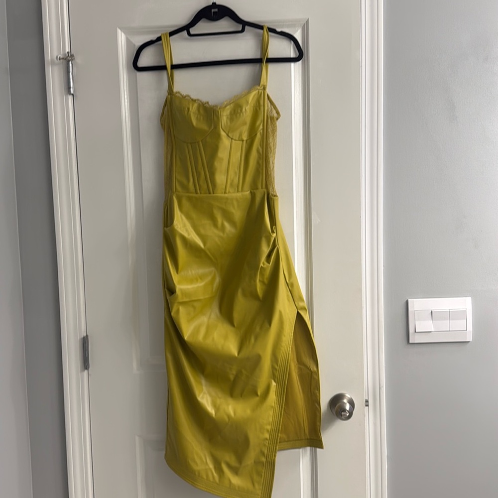 Faux leather lime green lace sides dress with split